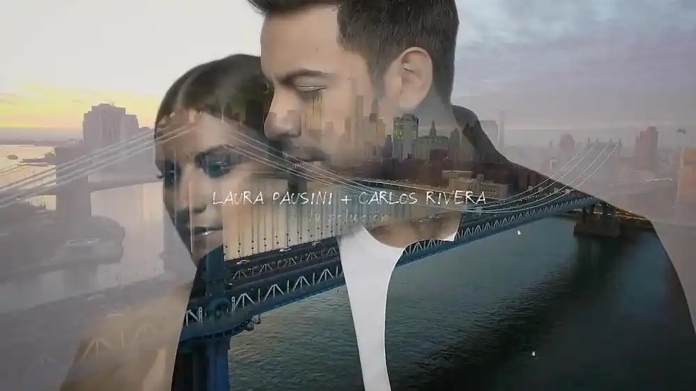 скачать клип Laura Pausini Feat. Carlos Rivera - La Solucion