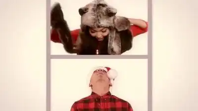 скачать клип Ariana Grande - Santa Tell Me