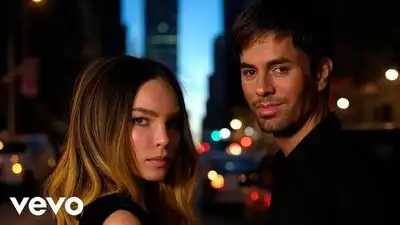 скачать клип Enrique Iglesia ft. Belinda - Llorame Un Rio