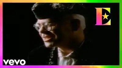 скачать клип Elton John - Sacrifice